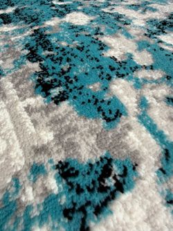 NEW 8x8 round Safavieh rug in teal/cream
