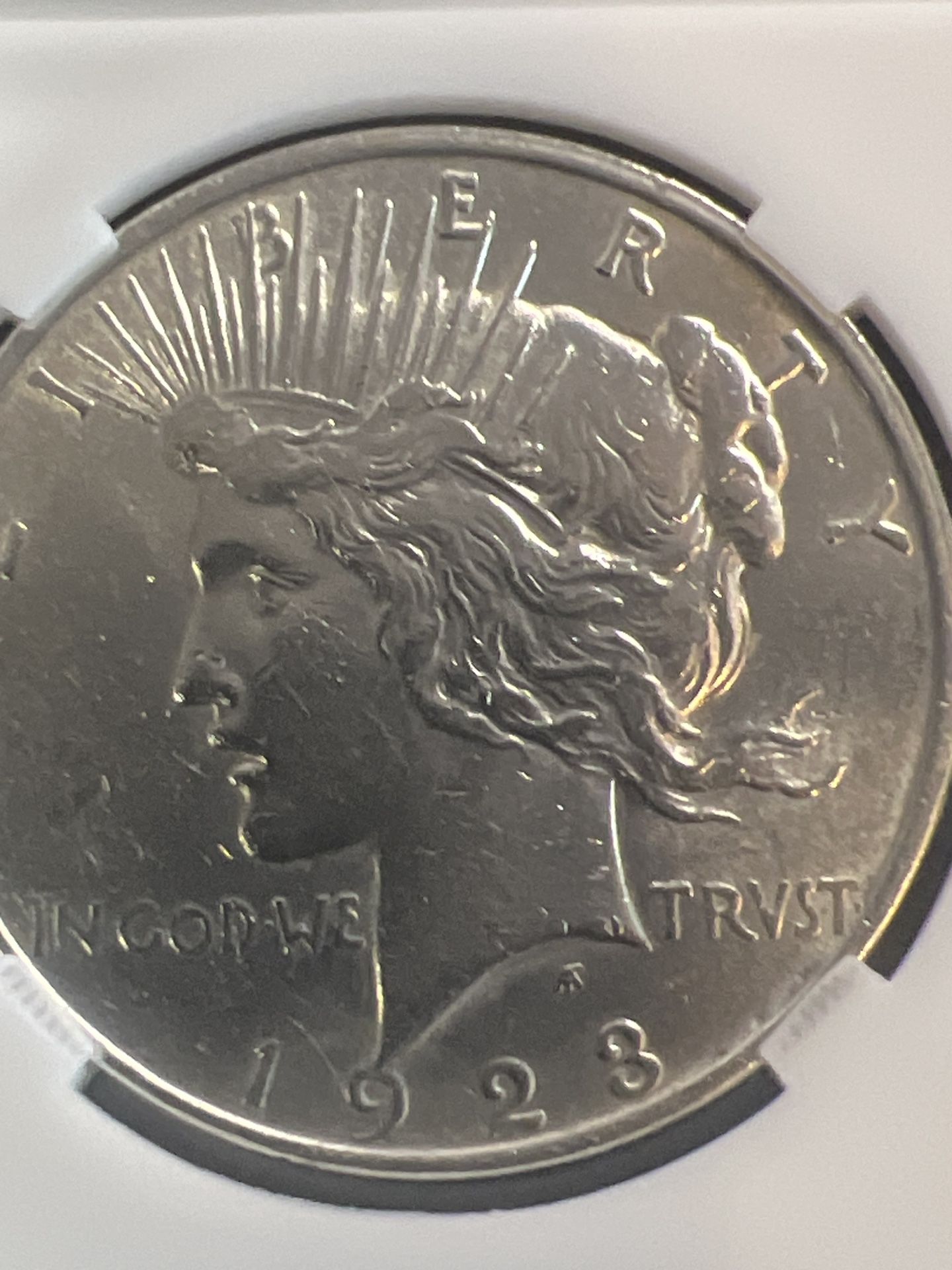 1928 Peace Dollar, one of the key date coins in the Peace series: