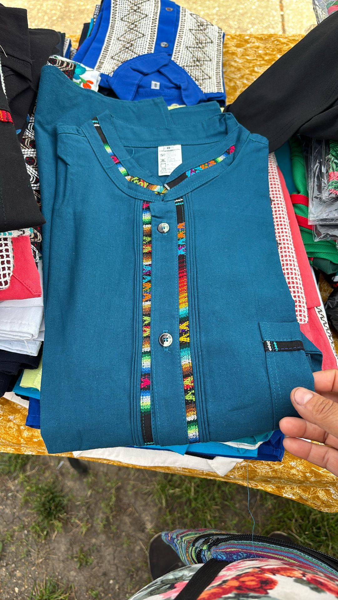 Camisa. L