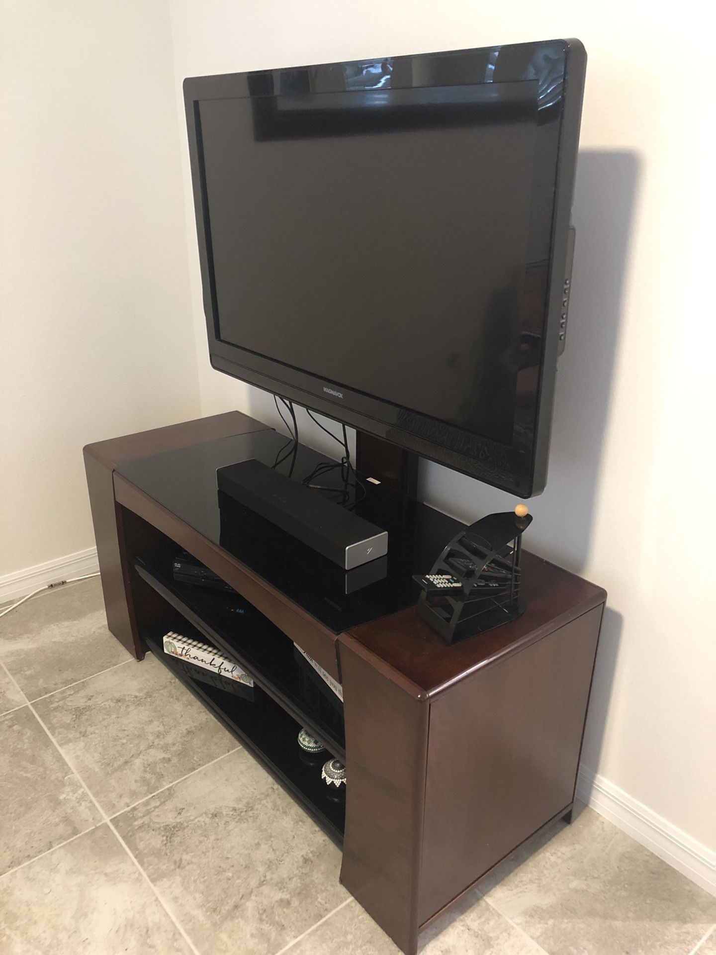 50’ Magnavock tv + tv set (sound bar not included)