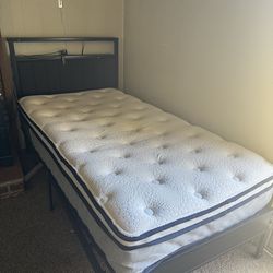 2 identical Twin beds with mattresses