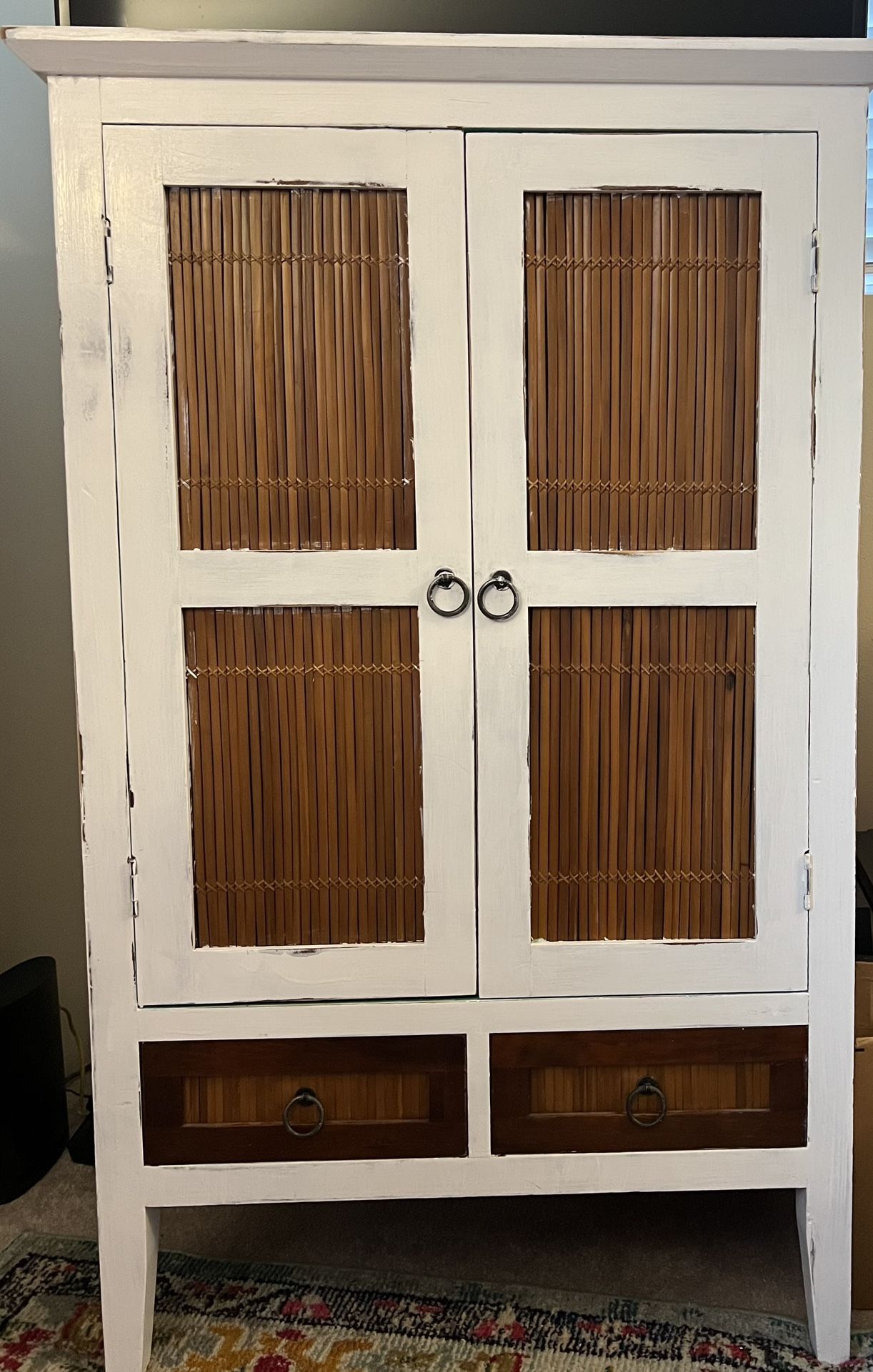 Beautiful Shabby Chic Distressed Solid Wood & Wicker Cabinet W/ Pop of Color Inside 47.25”x30”x23.5”.  Bring home  this piece and Make A Statement