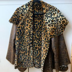 Fuzzy Cheetah and faux leather poncho type jacket!