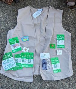 Girl Scouts vest and pins