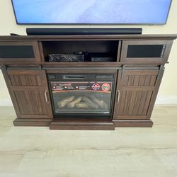 TV STAND FIRE PLACE AND IN BUILD SPEAKER