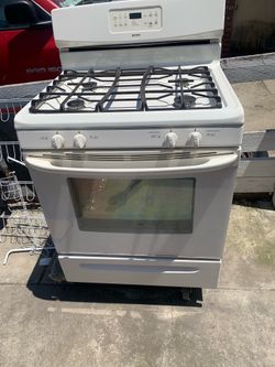 Gas stove in good condition; it is clean