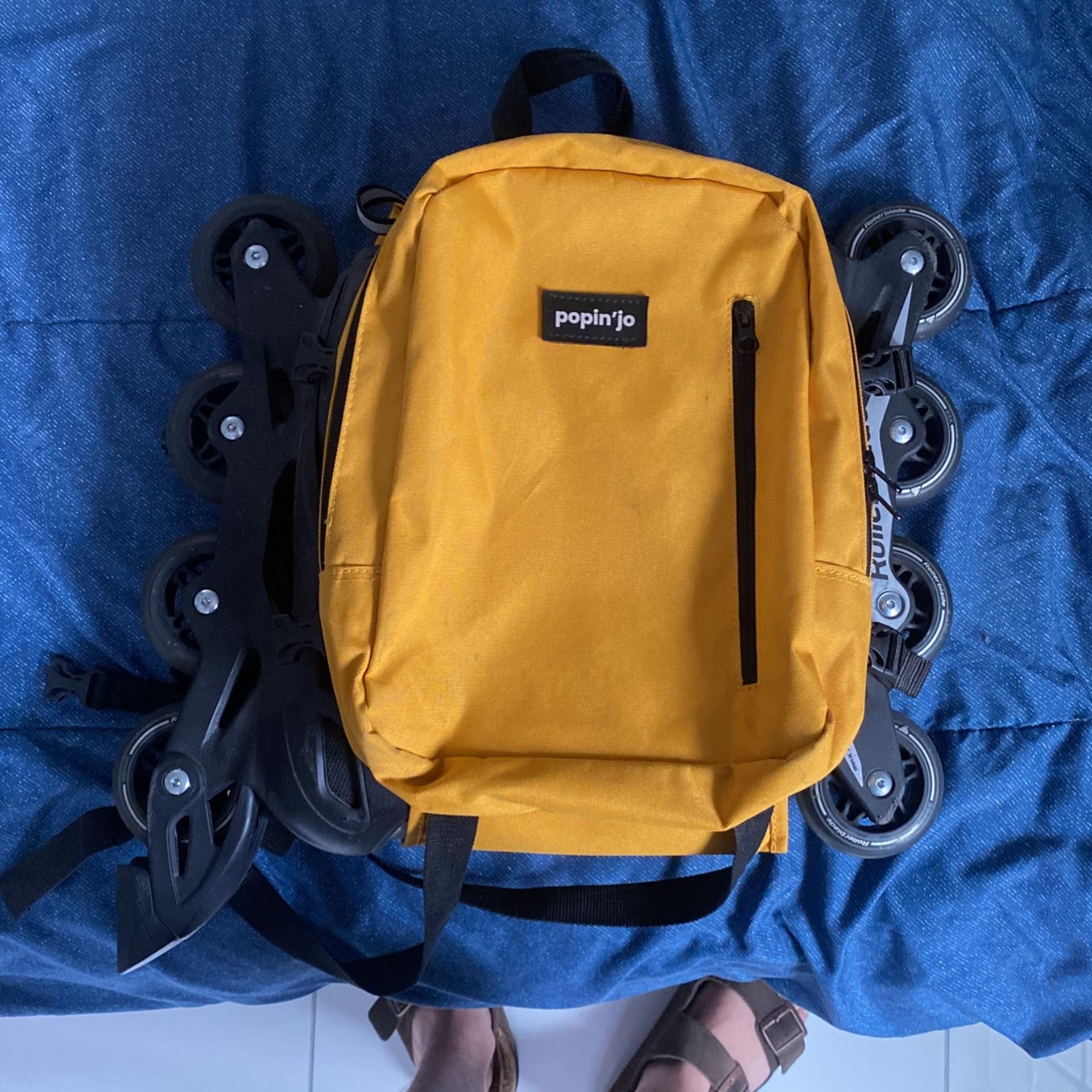 Rollerblades and Carrying Backpack