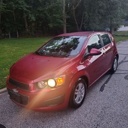 Must sell today!!! Clean Chevrolet Sonic Hatchback Red