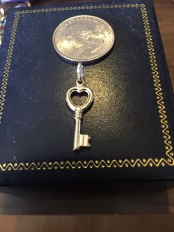 14 kt gold key