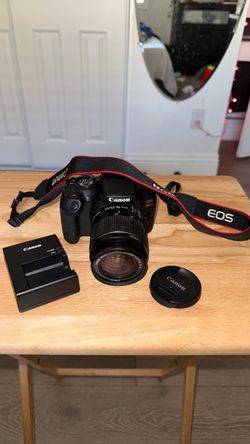 Canon EOS Rebel DSLR Camera with 18-55mm Lens