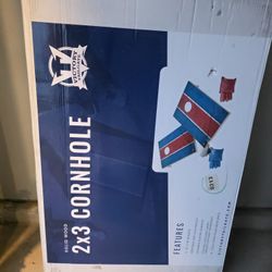 That’s a Victory Tailgate 2×3 solid-wood cornhole set (portable / lightweight version).