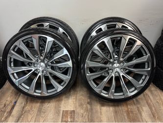 NEW 26 inch chrome snowflakes wrapped in 305/30r26 atturo az810 tires