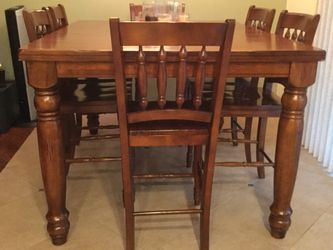 Solid wood dining table with six chairs