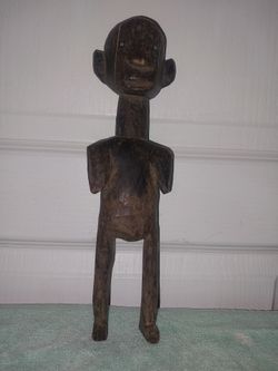 Antique, hand carved figurine