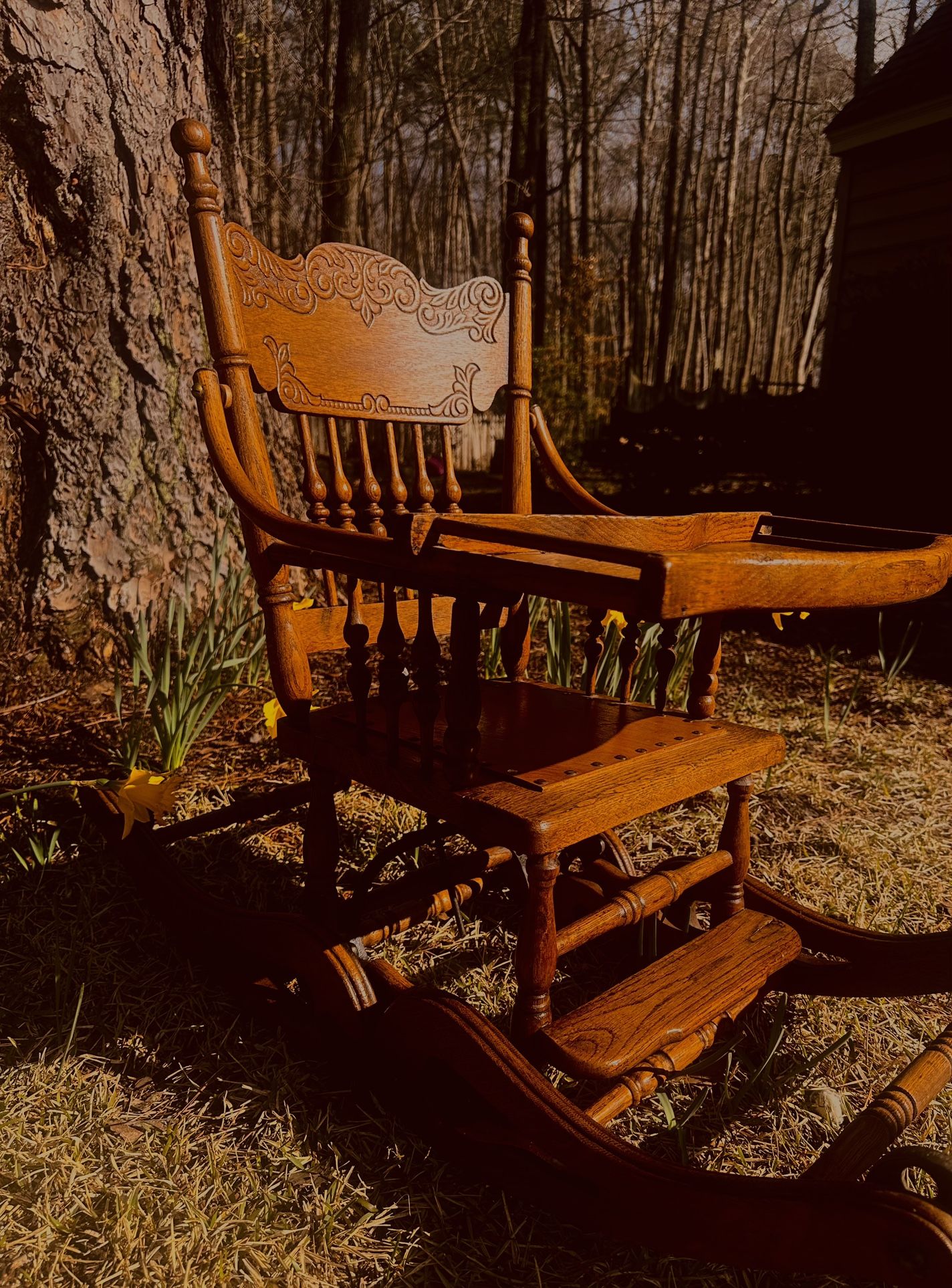 Antique Tiger Oak Convertible Pressed Back High Chair, Rocking chair, and Stroller in one.