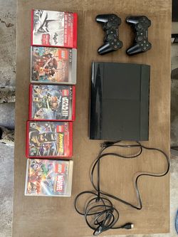 PlayStation 3 (super-slim), 2 controllers, 5 games