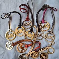 Michael Kors hang tags, bag accessories ($25 each)