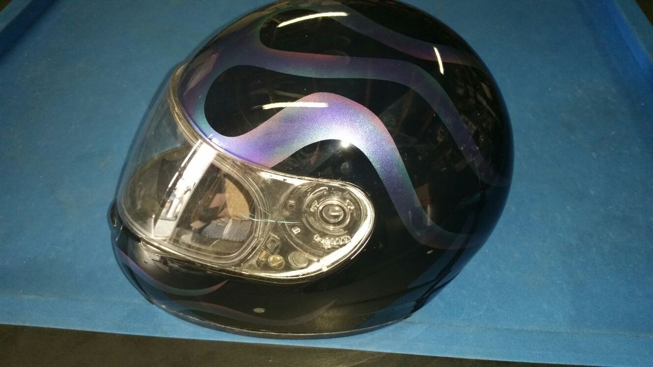 Used helmet w/ nice old school gost flames medium size