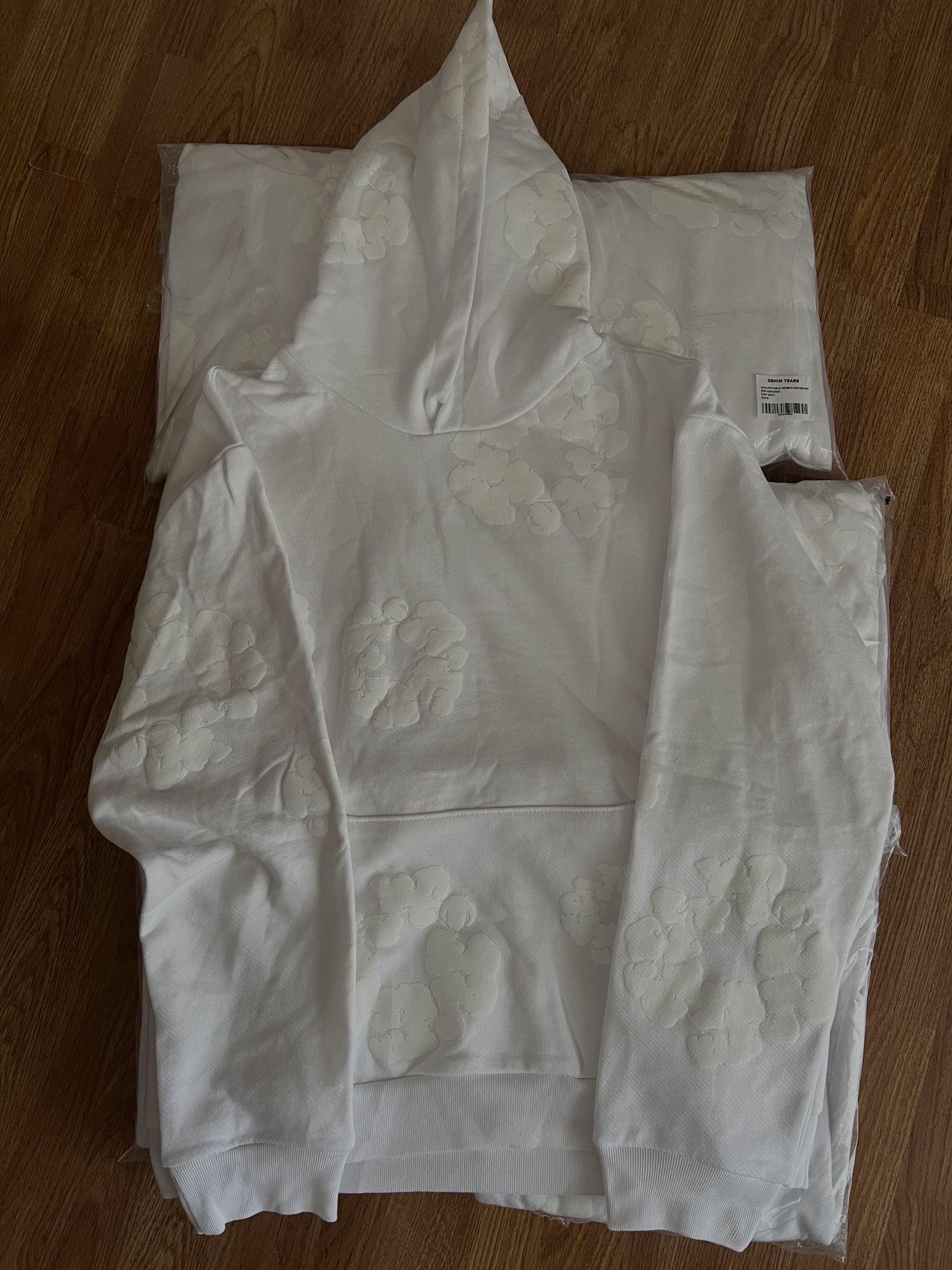 White monochrome denim tear 