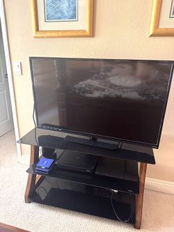 Vizio 42 in LED HDTV E420-A0 with 3 Shelf Black Glass and Wood TV Stand