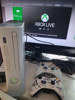 Xbox 360  Console Two Controllers(Swlling as is)