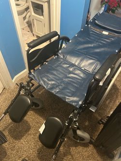 Wheelchair- Bariatric Reclining Wheelchair with Headrest + Elevating Footrests + Pushbar