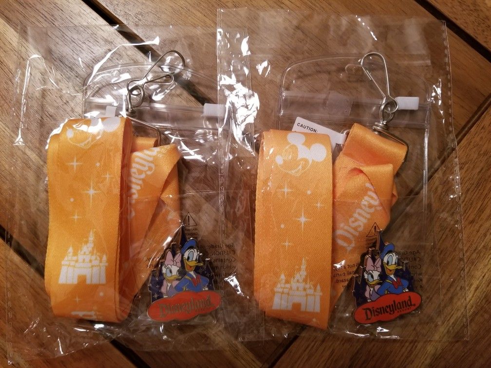 Disney Land 2 Badge Holders with 2 Pins open to trades