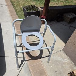 Aldult Potty Chair With Handhelds

Also can be used  for camping 