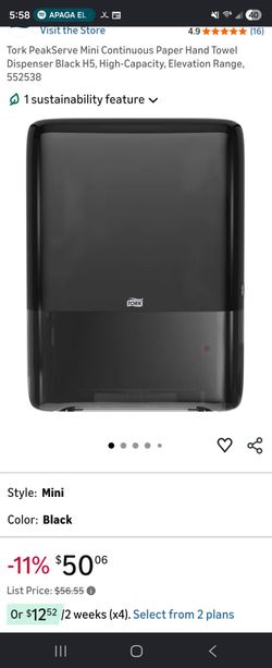 Used manual paper towel dispenser