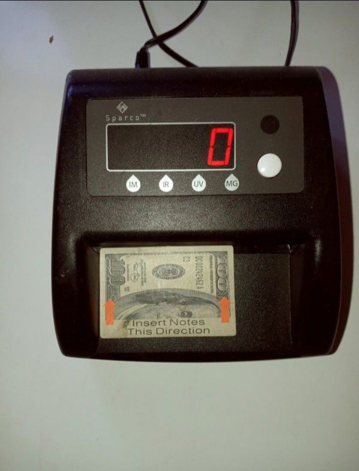 Counterfeit money checker