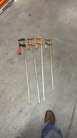 Four three-foot Furniture Clamps and one 14-inch pipe wrench