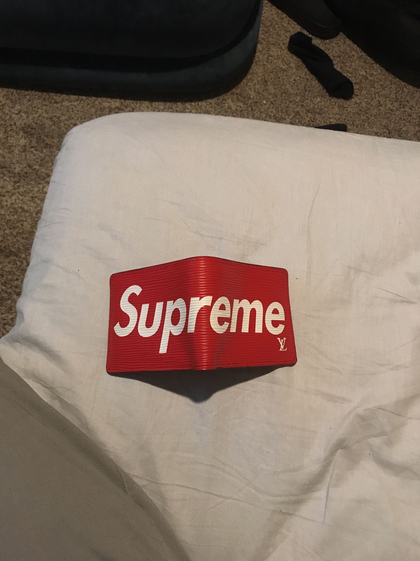 Supreme LV wallet. Trade for Xbox one