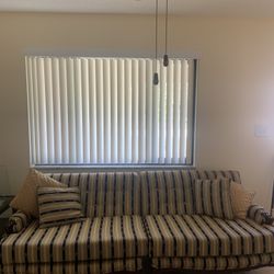 Black and gold stripe sofa