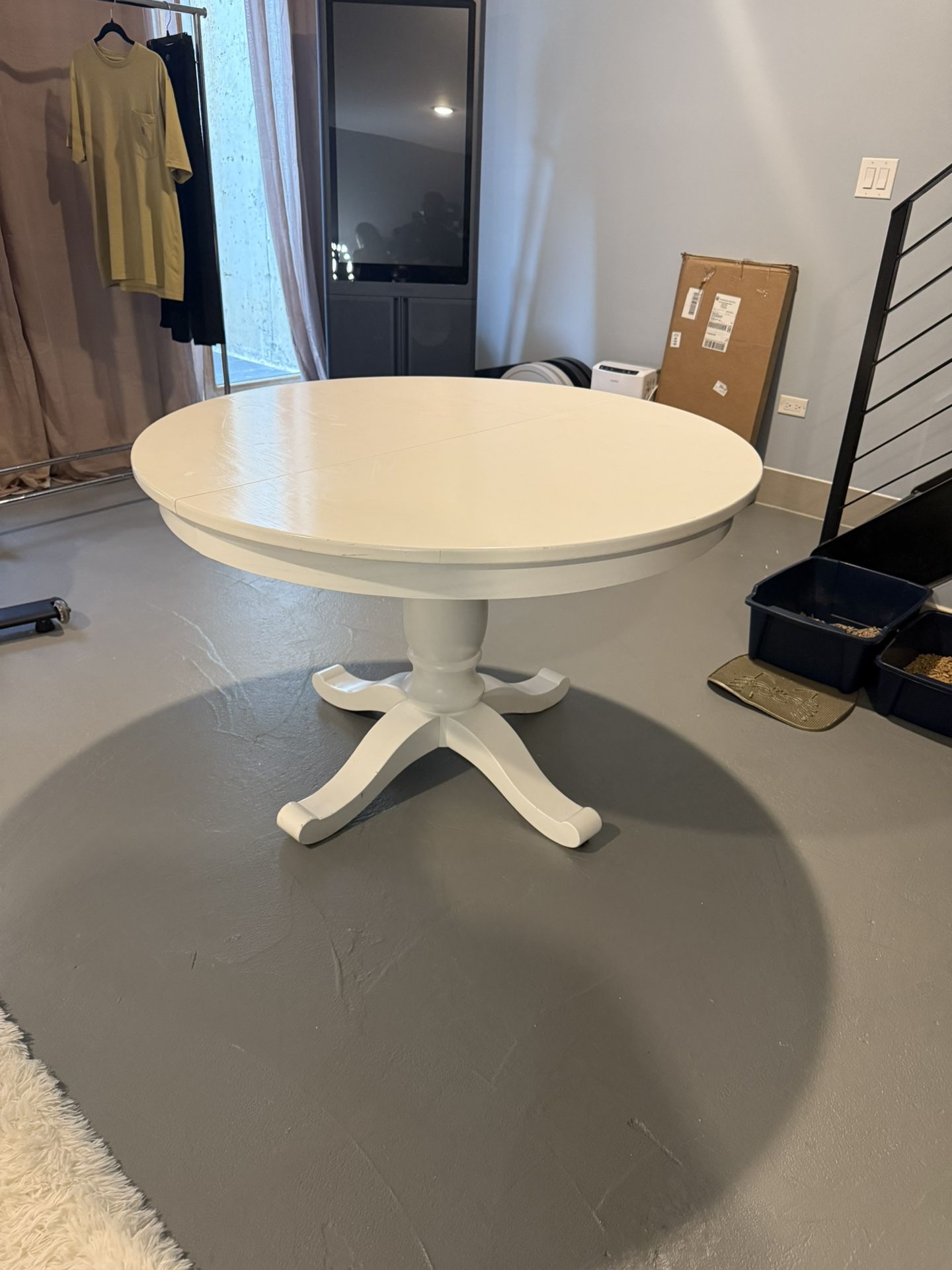 Pottery Barn Round Pedestal Extendable Table