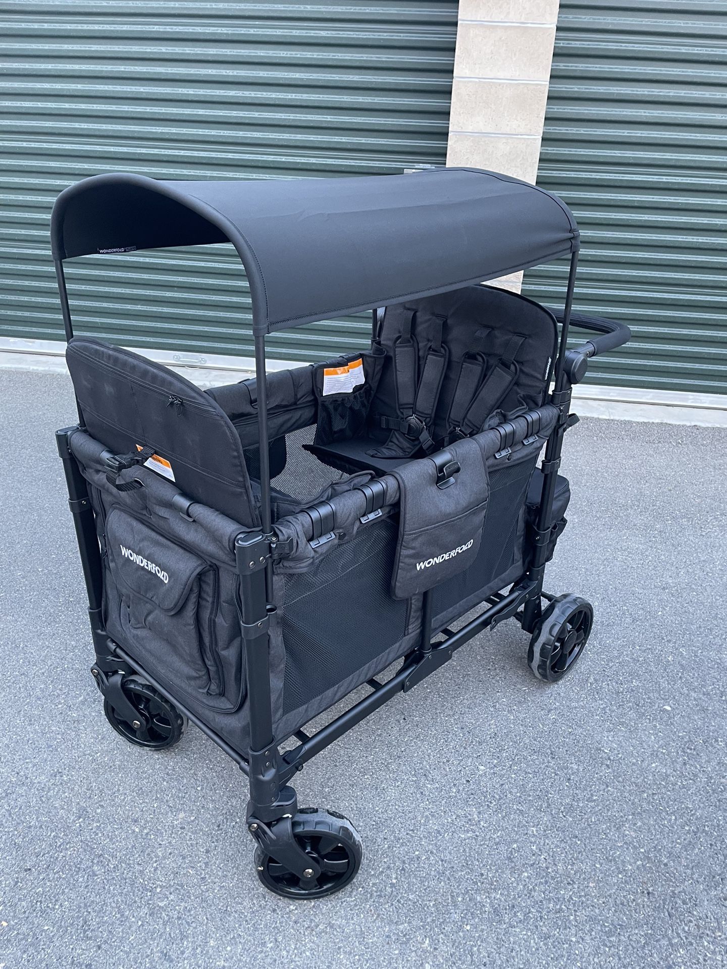 New, WONDERFOLD W4 Elite Stroller Wagon (4 Seater) - Collapsible Wagon Stroller