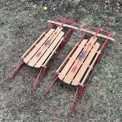 wooden snow sleds