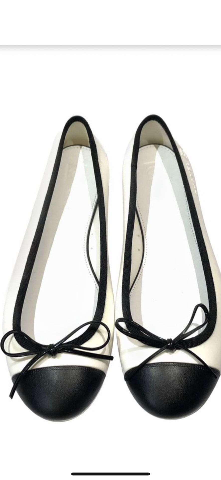 Unworn Chanel white and black flats