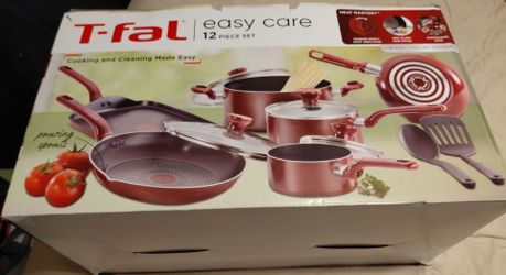 Brand new  beautiful T-fal 12 pieces cookware set in box.  ( never used ).