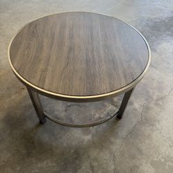 Coffee Table: Brown And Silver Trim (Price negotiable)