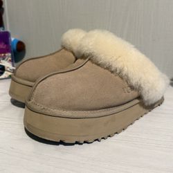 Tan and cream UGG slippers
