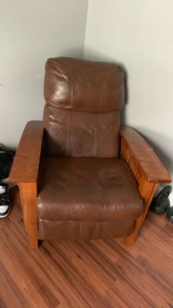 Brown leather and wood recliner
