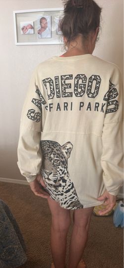 Large fit but  with extra small long sleeve, San Diego zoo shirt with glitter decal