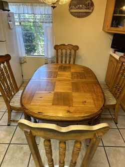 Dining Room Table and Set Of Chairs