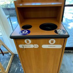 Garbage bin With recycling station.