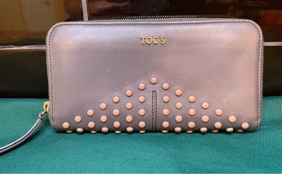 Stunning Tod’s Gommini collection zip around wallet with studs