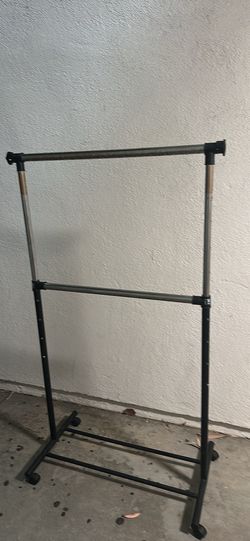 Hanger storage systems for hanging clothes with four wheels