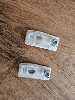 2007-2012 Nissan Altima license plate lamp assembly