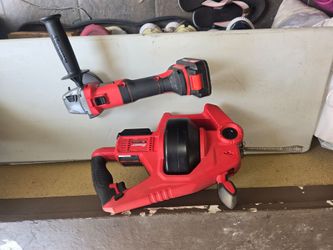 Sewer snake with battery grinder battery and charger
