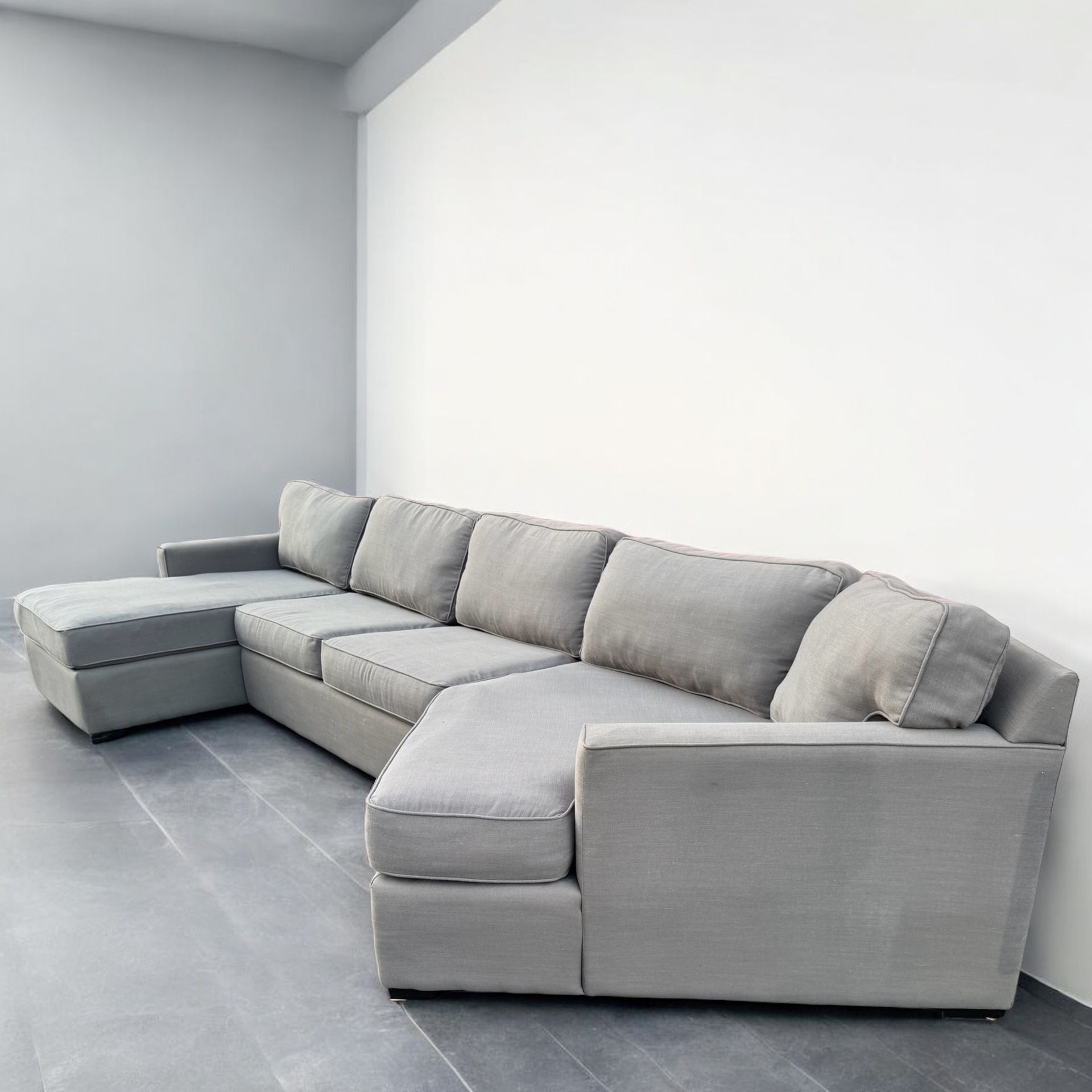 Long Gray Sectional Couch with Diagonal Chase - We Can Deliver