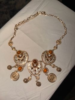Gold-Tone Filigree Statement Necklace with Orange Accent Stones
